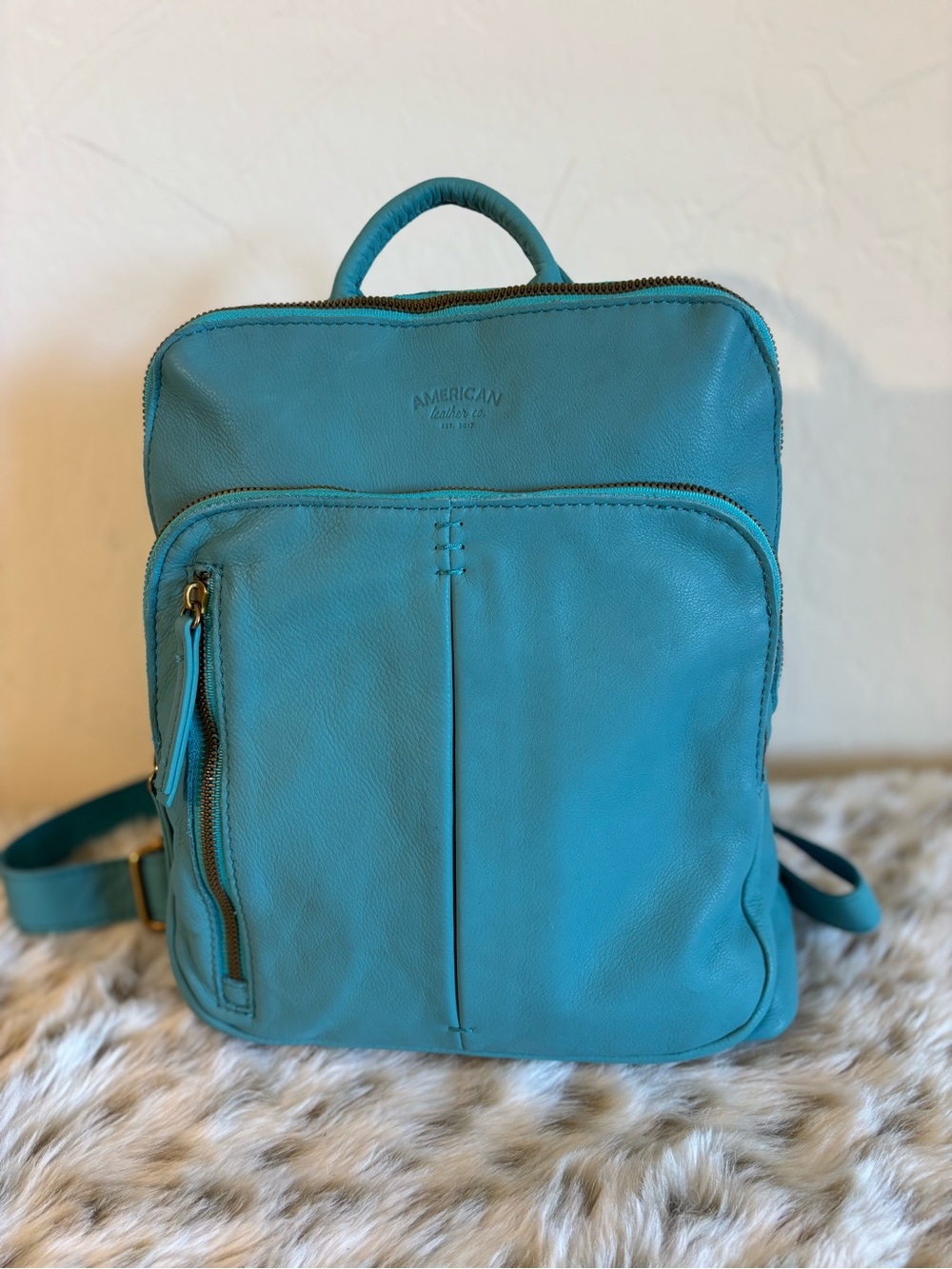 Poppy & Peonies Turquoise Backpack.